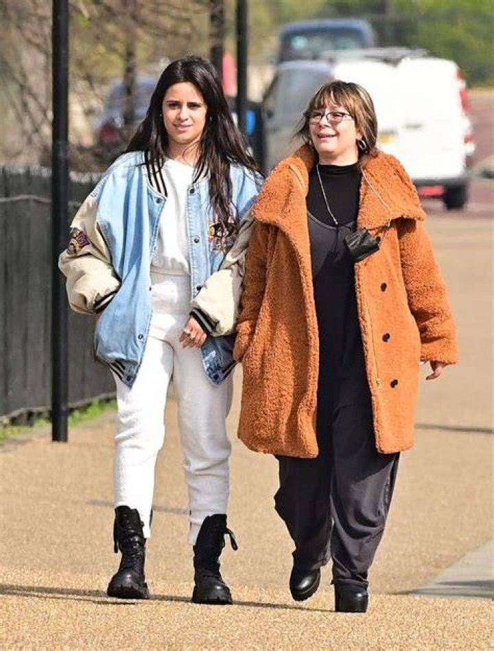  Sinuhe Estrabao (middle) with her husband Alejandro Cabello and celebrity daughter Camila Cabello.